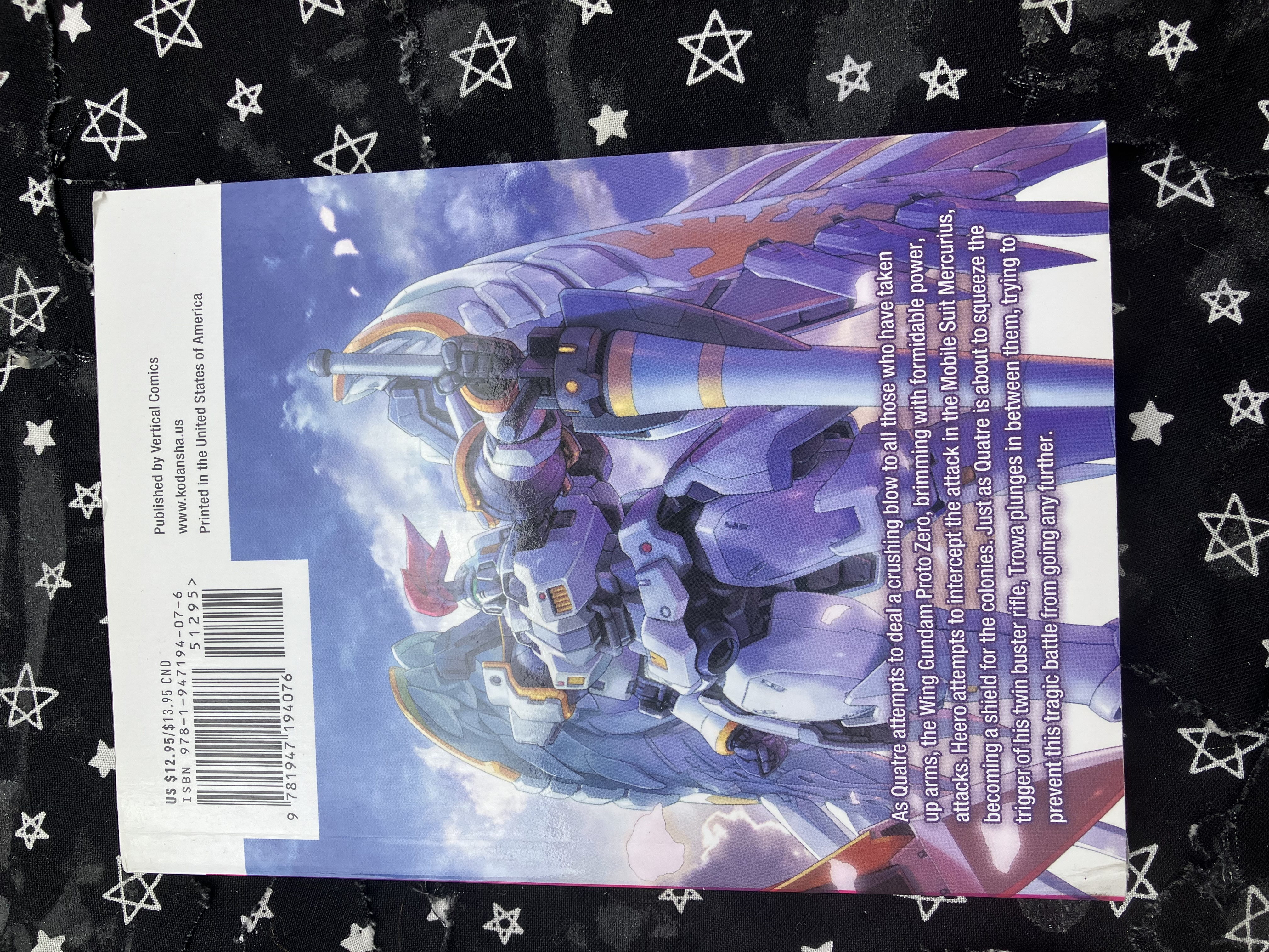 Back of Mobile Suit Gundam WING 7: Glory of the Losers with Tallgeese and the manga summary on it.